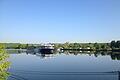 Flusskreuzfahrten sind in Mainfranken sehr beliebt, so die Fränkisches Weinland Tourismus GmbH mit Sitz in Würzburg. Im Bild ist der Main bei Volkach, im Hintergrund: Maria im Weingarten.
