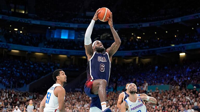 Paris 2024 - Basketball       -  Die NBA-Stars um LeBron James treffen nun auf Brasilien.