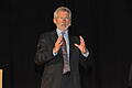 Paul Breitner in Gemünden       -  Paul Breitner war mit seinem aktuellen Vortrag 'Fußball zwischen gesellschaftlichem Auftrag, Entertainment und Kommerz' zu Gast  in der Scherenberg-Halle in Gemünden, in die die Raiffeisenbank Main-Spessart eingeladen hatte.