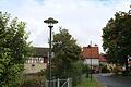 An der Weht in Großwenkheim stehen historische Lampen. Davon wird es bald noch mehr im Ort geben. Foto: Thomas Malz       -  An der Weht in Großwenkheim stehen historische Lampen. Davon wird es bald noch mehr im Ort geben. Foto: Thomas Malz