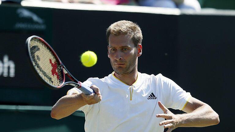 Unterlegen - Florian Mayer verliert sein Match gegen den Kroaten Marin Cilic. Foto: Kirsty Wigglesworth Unterlegen - Florian Mayer verliert sein Match gegen den Kroaten Marin Cilic. Foto: Kirsty Wigglesworth