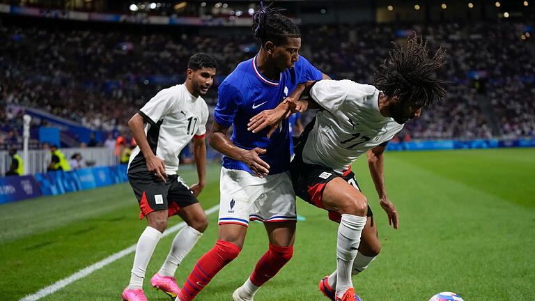 Paris 2024 - Fußball       -  Bayern München Neu-Profi Michael Olise (Mitte) sorgte für den Endstand.