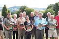 Karl-Friedrich Abe (vorne, blaues Hemd) und Ulrike Schade (daneben) von der Thüringer Verwaltung des Biosphärenreservats Rhön und weitere Autoren der neuen „Mitteilungen aus dem Biosphärenreservat“.