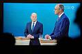 Scholz und Merz im TV-Duell       -  Heftige Wortgefechte: Olaf Scholz und Friedrich Merz im TV-Duell von ARD und ZDF.