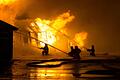 AdobeStock_64529909       -  Rund 80 Feuerwehrleute mussten am Samstagabend zum Brand einer großen Scheune bei Bad Kissingen ausrücken. Die Lagerhalle brannte komplett aus, ein Waldbrand konnte knapp verhindert werden. Symbolfoto: Anton Gvozdikov/Adobe Stock