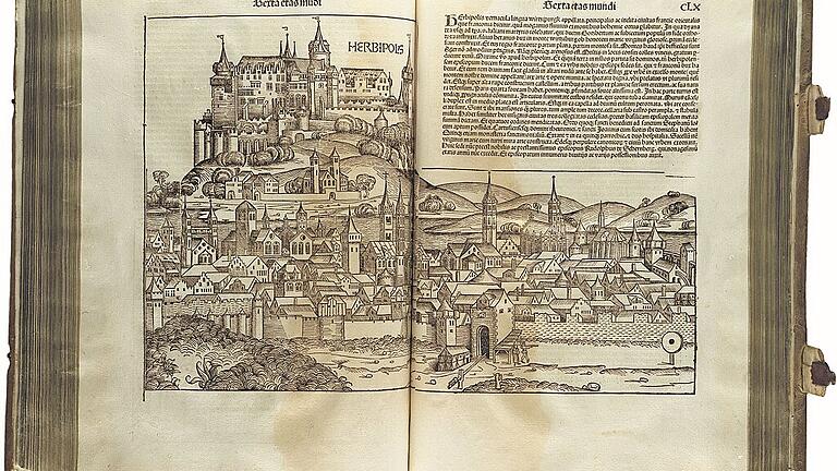 Ein Bestandteil der neuen Sonderausstellung: Weltchronik von Hartmann Schedel, lateinische Ausgabe, Nürnberg 1493, aufgeschlagen ist Würzburg. Erworben am 15. März 1951 bei Karl & Faber.