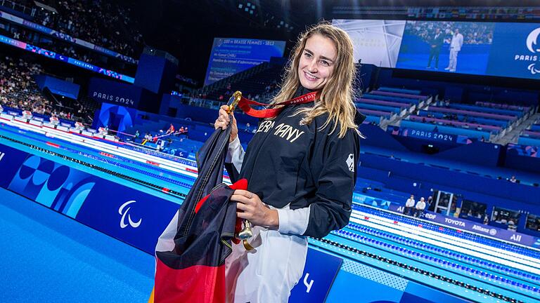 Elena Semechin       -  Schwimmerin Elena Semechin hat Gold gewonnen und darf die deutsche Fahne tragen.