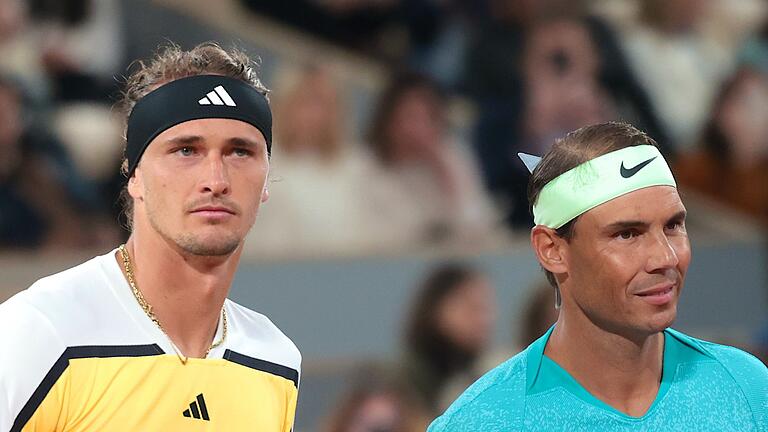 Alexander Zverev (l) und Rafael Nadal (r)       -  Alexander Zverev (l) wird beim Abschied von Rafael Nadal in Malaga nicht vor Ort sein.