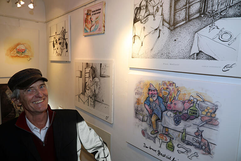 Der Karlstadter Karikaturist Carlo Dernbach hat die Galerie im 'Oberen Tor' zum ersten Fränkischen Weinkarikaturmuseum umfunktioniert. Der Karlstadter Karikaturist Carlo Dernbach hat die Galerie im 'Oberen Tor' zum ersten Fränkischen Weinkarikaturmuseum umfunktioniert.