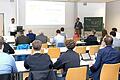 Professor Dr. Anatoli Wellhöfer (links) und Prof. Dr. Markus H. Zink begrüßen die Teilnehmerinnen und Teilnehmer beim zweiten Regionalen Energietechnik-Symposium an der THWS.