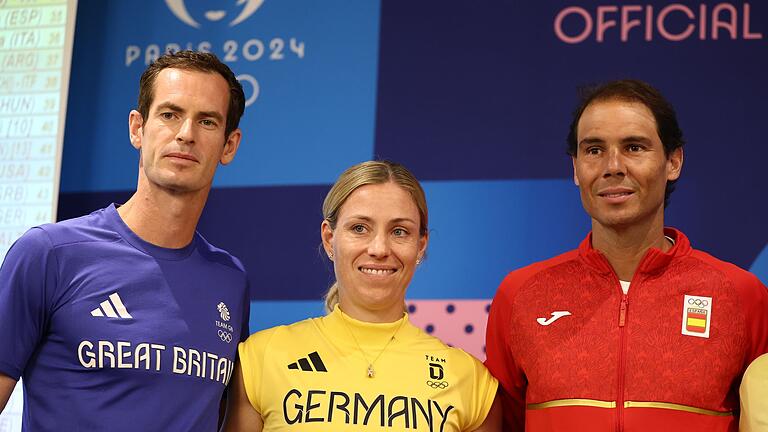 Paris 2024 - Vorbereitungen       -  Kerber lächelt für die Kameras - aber ihr Gefühl nach der Rücktritts-Ankündigung ist anders.