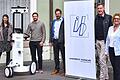 &nbsp;Übergabe des Trolleys am Campus Röntgenring (von links): Theresa Meyer (FHWS), Fabian Roth, Dr. Andreas Wagner, Claus Fischer (alle Angermeier Ingenieure) und Prof. Daniela Wenzel (FHWS)