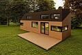 Das Tiny House gibt es mittlerweile in vielen Formen und Ausführungen, hier ein Symbolbild für einen Flachbau aus Holz.