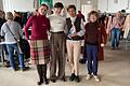 Martina Höller, Heike Engelhardt und Marlene Lauter von Soroptimist International Würzburg mit Sabine Kaldnek von Femnet beim Secondhandbasar 'Fair Tragen' im Burkardushaus in Würzburg.