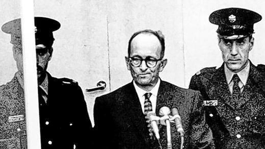 Adolf Eichmann (Mitte) am ersten Prozesstag im April 1961. Adolf Eichmann (Mitte) am ersten Prozesstag im April 1961.
