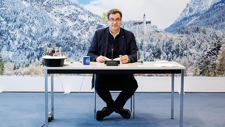 Will die vom Bund beschlossene Impfpflicht für Gesundheitsberufe in Bayern vorerst nicht umsetzen: Ministerpräsident Markus Söder (CSU). Will die vom Bund beschlossene Impfpflicht für Gesundheitsberufe in Bayern vorerst nicht umsetzen: Ministerpräsident Markus Söder (CSU).