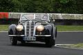 Kurvenfahrt: Der BMW 327 Sport Cabriolet, Baujahr 1939, von Ulrich Adams (links) bei der Wertungsprüfung auf der Kartbahn in Gerolzhofen mit Johannes Solger am Steuer und Redaktionsleiter Norbert Hohler auf der Rückbank.