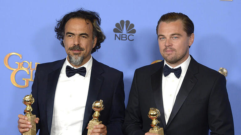 73. Golden Globe Awards       -  Mexican director Alejandro Inarritu (L) and US actor Leonardo DiCaprio hold the awards for Best Director, Best Motion Picture Drama and Best Actor Drama for 'The Revenant' in the press room during 73rd Annual Golden Globe Awards at the Beverly Hilton Hotel in Beverly Hills, California, USA