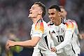 Florian Wirtz (l.) und Jamal Musiala       -  In der Liga Konkurrenten, im DFB-Trikot die Zukunft: Florian Wirtz (l.) und Jamal Musiala.