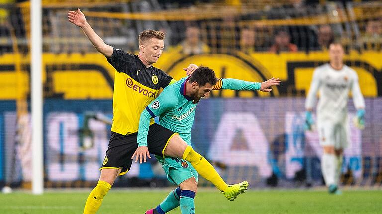 Marco Reus und Lionel Messi       -  In der Champions League trafen Reus und Messi nur sehr selten aufeinander.