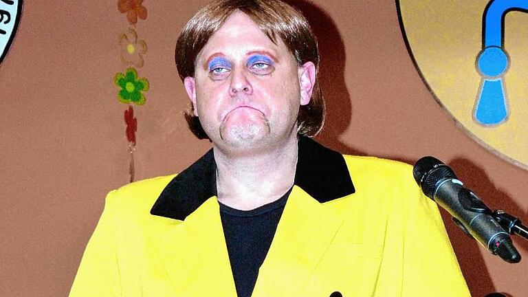 Ralf Imhof als Kanzlerin in der Bütt.