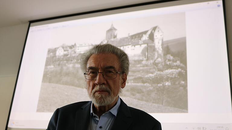 Der Historiker Winfried Mogge hat einen ersten Werkstattbericht über Stadt und Burg Rothenfels in der NS-Zeit abgeliefert. Das historische Foto im Hintergrund stammt vom Lohrer Fotografen Franz Wilhelm Schäfer.&nbsp;