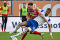 FC Augsburg - FC Schalke 04       -  Internationale Härte zwischen dem FC Augsburg und Schalke: Dion Beljo (hinten) und Schalkes Moritz Jens kämpfen um den Ball.