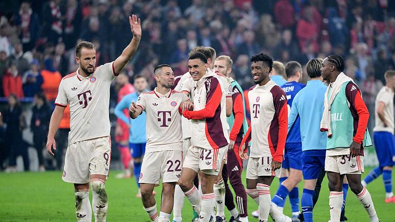 FC Bayern München - Dinamo Zagreb       -  Harry Kane (l) jubelt als Mann des Abends.