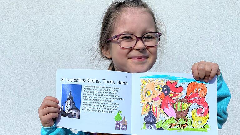 Juna (5 Jahre) aus Marktheidenfeld hat die Sonne in verschiedenen Gelbtönen ausgemalt und dem Hahn bunte Federn verpasst.