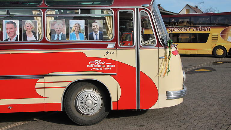 Die fünf Landratskandidaten – hier noch als Fotoporträts – werden am Samstag mit dem Oldtimerbus von Spessart-Reisen Hock auf Fahrt durch den Landkreis gehen.&nbsp;