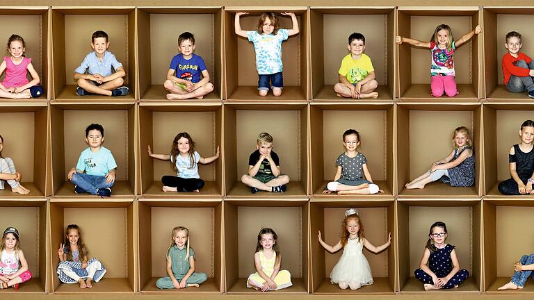 Es geht um die Zukunft der Kinder: Am Sonntag, 15. Mai, entscheiden die Wiesentheider Bürgerinnen und Bürger über den Standort für einen neuen Kindergarten. Diese Fotocollage von 2020 zeigt die damaligen Vorschulkinder im Kindergarten St. Mauritius in Wiesentheid.