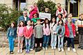 Kommunionkinder aus Eußenheim und Ortsteilen zusammen mit Pfarrer Niko Stanek und den Klinikclowns.