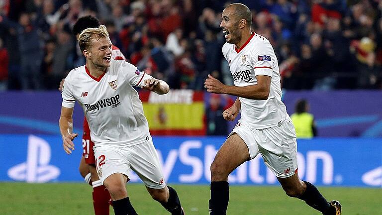 Sevilla s Argentinian midfielder Guido Pizarro R jubilates the third goal of the team with Johanne - Sein bisher einziger Champions-League-Einsatz: Johannes Geis (links) jubelt mit Guido Pizarro über dessen 3:3-Ausgleich gegen Liverpool, nachdem Sevilla bereits mit 0:3 hinten gelegen hatte. Sevilla s Argentinian midfielder Guido Pizarro R jubilates the third goal of the team with Johanne - Sein bisher einziger Champions-League-Einsatz: Johannes Geis (links) jubelt mit Guido Pizarro über dessen 3:3-Ausgleich gegen Liverpool, nachdem Sevilla bereits mit 0:3 hinten gelegen hatte.