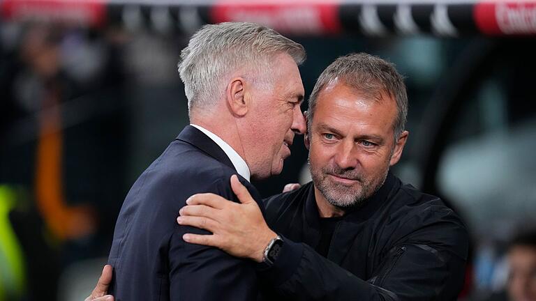Real Madrid - FC Barcelona - Carlo Ancelotti (l.) hatte mit Hansi Flick kein Problem, wohl aber mit dessen Assistenten Marcus Sorg. Real Madrid - FC Barcelona - Carlo Ancelotti (l.) hatte mit Hansi Flick kein Problem, wohl aber mit dessen Assistenten Marcus Sorg.