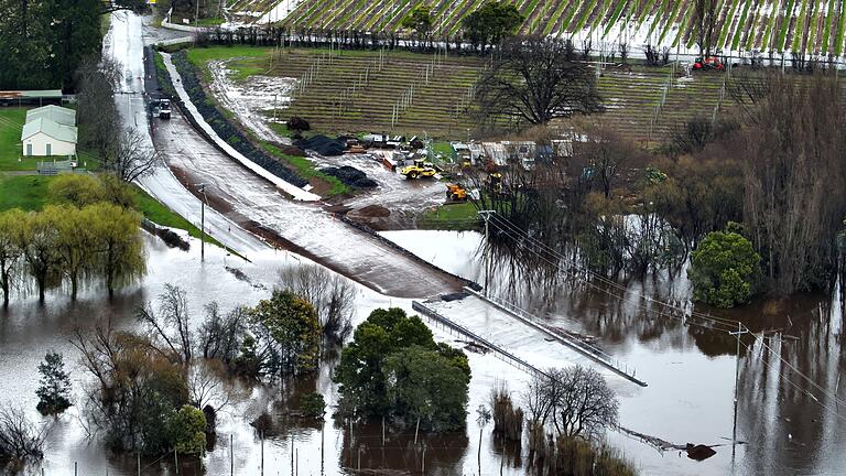 Australien Unwetter - Tasmanien       -  Stromausfälle, Evakuierungen und überschwemmtes Land: Die Unwetter haben Down Under fest im Griff.