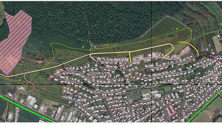 Der Bebauungsplan &bdquo;Am Herrenwald&ldquo; mit vorgesehener Verkehrsanbindung an die Staatsstraße 2447, hineingelegt in eine Satellitenaufnahme.