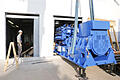 Das Blockheizkraftwerk Heuchelhof erhielt zwei neue Gasmotoren mittels eines 60-Tonnen-Krans. Foto: Johannes Kiefer