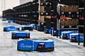 Roboter zum Transportieren von Waren fahren in einem Lager im Cainiao Future Park in Wuxi. In dem Lager arbeiten rund 700 intelligente Roboter. Ein Beispiel dafür, dass China bei der Digitalisierung auf der Überholspur ist.