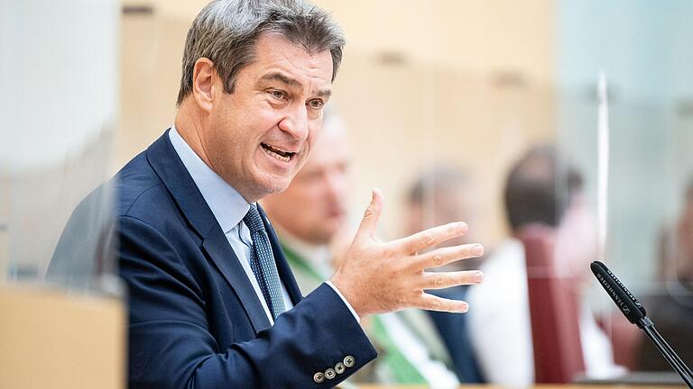 Ministerpräsident Markus Söder (CSU) will die Maßnahmen für den Klimaschutz in Bayern deutlich verschärfen. Die Landtags-Opposition sieht darin aber vor allem 'Symbolpolitik'. Ministerpräsident Markus Söder (CSU) will die Maßnahmen für den Klimaschutz in Bayern deutlich verschärfen. Die Landtags-Opposition sieht darin aber vor allem 'Symbolpolitik'. 
