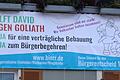 Ein Plakat der Volkacher Bürgerinitiative Eichfelder/Rimbacher /Ringstraße (BIERR) fordert ein 'Ja' zum Bürgerbegehren und verglich den Kampf gegen die beiden viergeschossigen Häuser mit 'David gegen Goliath'.