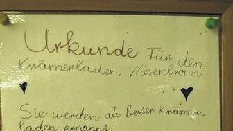Eine Urkunde für den besten Krämerladen.
