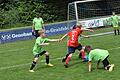 Der Stockheimer U9-Spieler Lias Leutbecher (rotes Trikot) ist gegen Bischofsheim nicht zu stoppen.