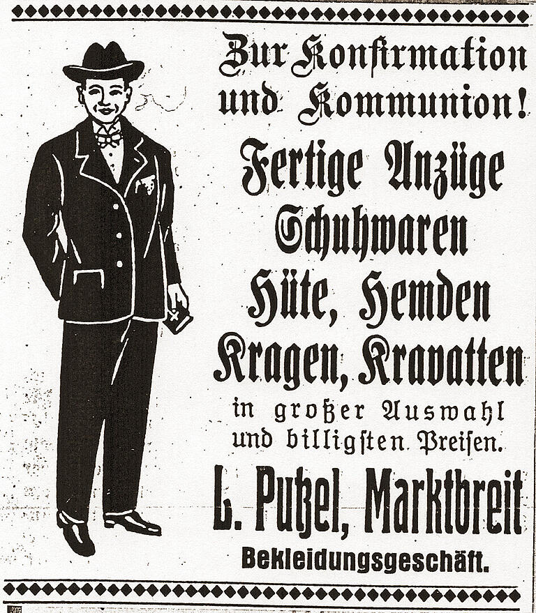 Jüdisches Leben in Marktbreit (Lkr. Kitzingen): Anzeige des ehemaligen großen und angesehenen Kaufhauses von Sabina und Leopold Putzel am Schlossplatz. Jüdisches Leben in Marktbreit (Lkr. Kitzingen): Anzeige des ehemaligen großen und angesehenen Kaufhauses von Sabina und Leopold Putzel am Schlossplatz.