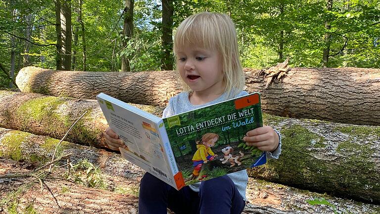 Das Gewinnerfoto beim Fotowettbewerb des BIZ von Teresa Hümmer zeigt ihre Tochter Klara gemütlich lesend im Sailershäuser Wald. Das Gewinnerfoto beim Fotowettbewerb des BIZ von Teresa Hümmer zeigt ihre Tochter Klara gemütlich lesend im Sailershäuser Wald.