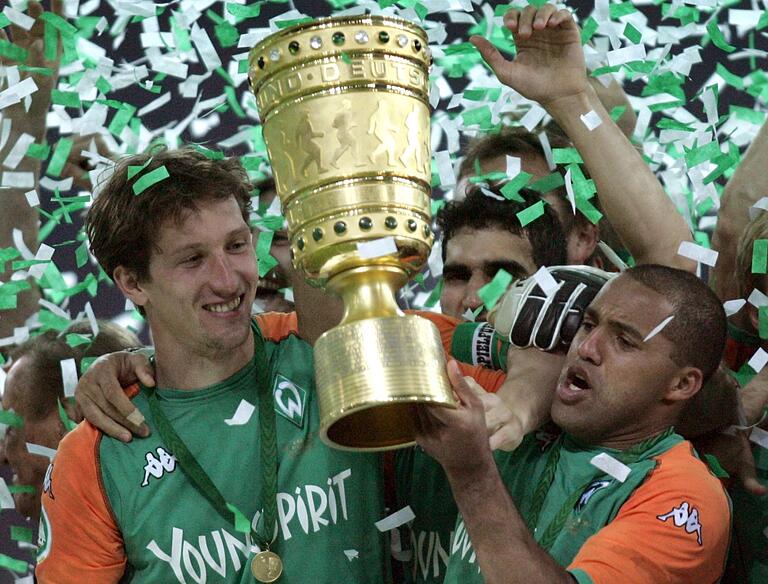 2004 gewannen Frank Baumann und Ailton mit Werder Bremen den DFB-Pokal, fast 20 Jahre später werden sie an diesem Samstag beim TSV Grombühl wieder gemeinsam auf dem Fußballplatz stehen.