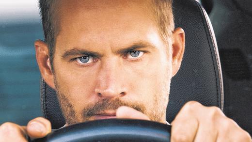 Stahlharter Blick: Paul Walker in einer Szene des neuen, siebten Films aus der &bdquo;Fast & Furious&ldquo;-Reihe.