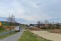 Die Firma Ganshorn baut 'Am Altenberg' in Bad Neustadt einen neuen 'Headquarter'. Die Planierungsarbeiten haben begonnen (im Bild vorne rechts). Der Spatenstich ist für den 8. April geplant.