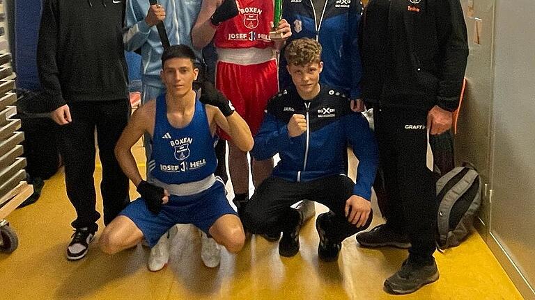 Boxen TSV Bad Kissingen       -  Unser Bild zeigt die TSV-Boxer mit (vorne, von links) Fahim Mohammadi und Leo Zenglein; (mittlere Reihe, von links) Erjon Beqiri, Mubaser Jabharkhail, Daniel Wölk, Carolin Bönning und Trainer Edgar Feuchter sowie (hinten) Michael Lazutin. Für Lazutin und Carolin Bönning waren keine Gegner vorhanden.