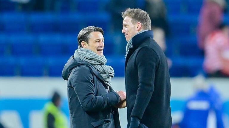 Niko Kovac (l) will mit dem FC Bayern Julian Nagelsmann mit RB Leipzig vom Spitzenplatz der Tabelle verdrängen. Foto (Archiv): Uwe Anspach Foto: Uwe Anspach       -  Niko Kovac (links) ist zurück in der Bundesliga. Dort wird er auch auf Julian Nagelsmann und den FC Bayern treffen.