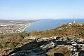 Würzburgs Partmnerstadt Bray in Irland.       -  20 Minuten anspruchsvolles Bergwandern, die sich lohnen: Blick vom Berg »Bray Head« auf Würzburgs Partnerstadt Bray und am Horizont die irische Hauptstadt Dublin.